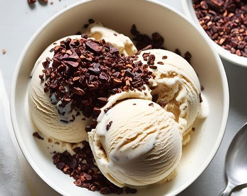 Raw cacao nibs over ice cream