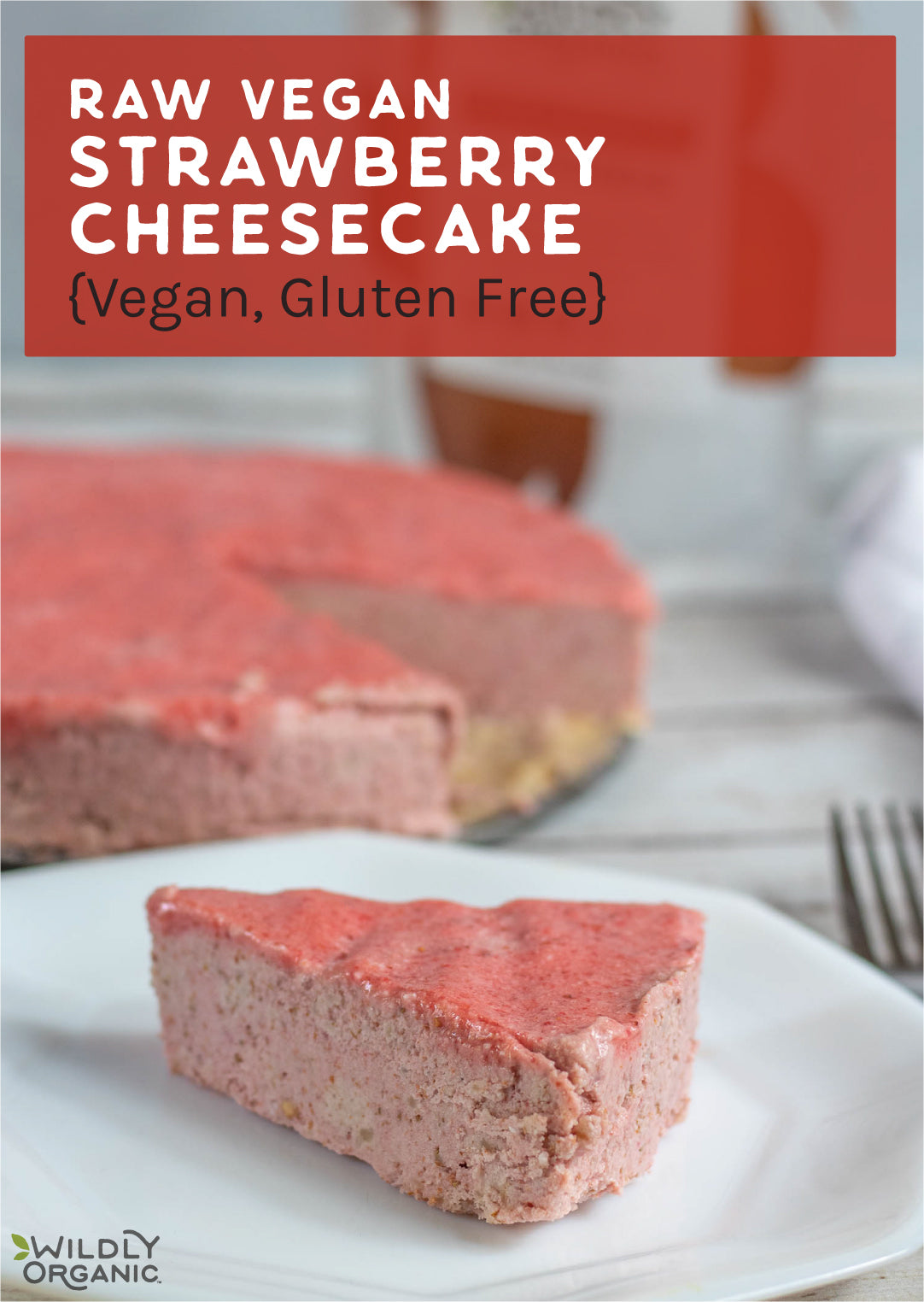 Raw Strawberry Cheesecake {Vegan, Gluten-free} a piece of raw strawberry cheesecake on a white plate with a fork next to it and Wildly Organic packaging in the background