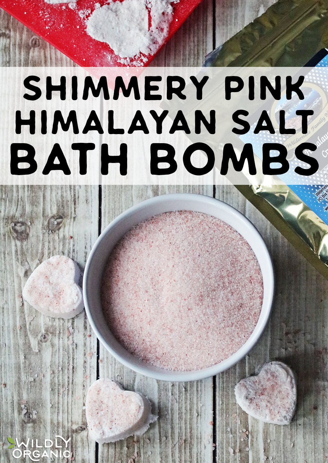 Shimmery pink himalayan bath bombs with A bowl of pink salt next to a bag of bath bombs